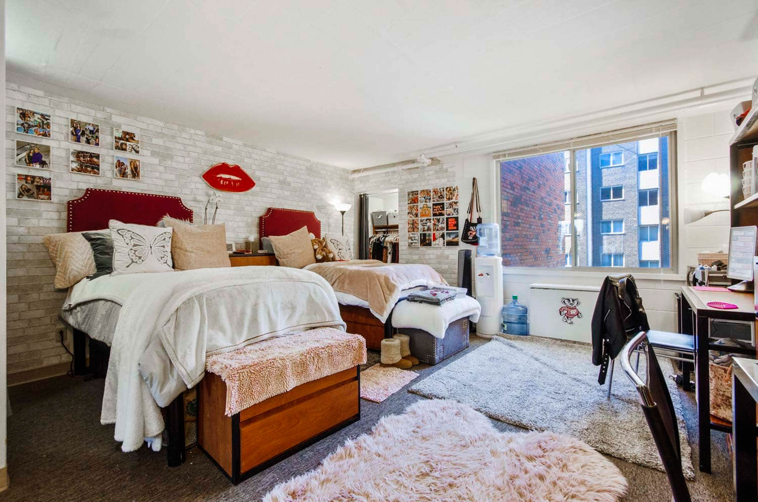 Youthful college dorm room with two twin beds and desks